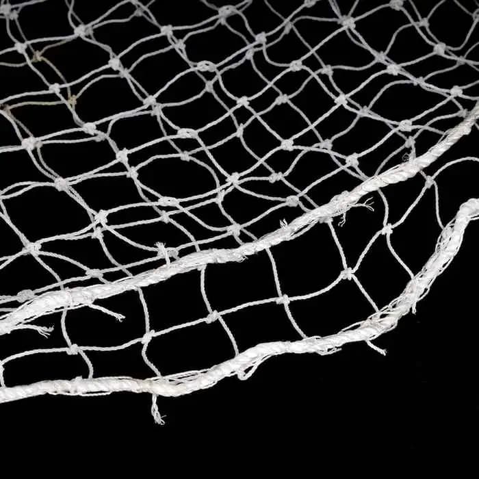 Close-up of Garware HDPE bird net showing strong knots and border rope for durable balcony bird protection